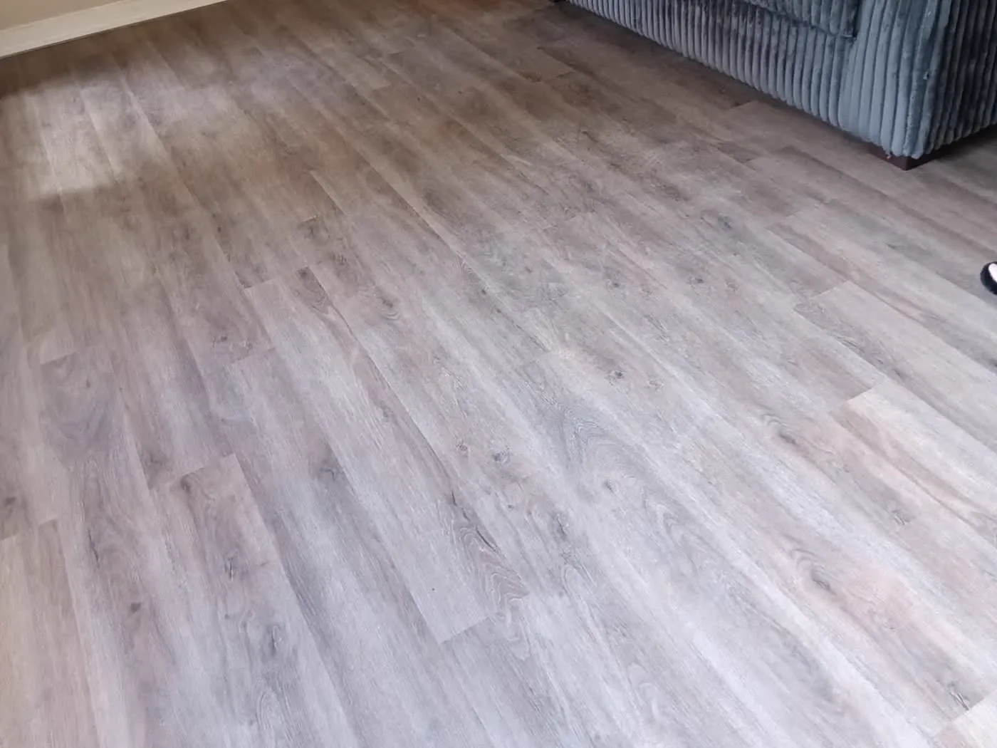 Light wood-look luxury vinyl plank in a living room