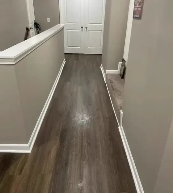 Gray luxury vinyl plank hallway